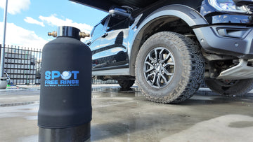 Spot Free Rinse DI tank next to a 4WD vehicle