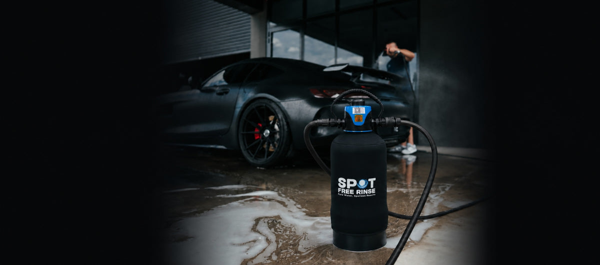 Spot Free Rinse tank next to a freshly washed car