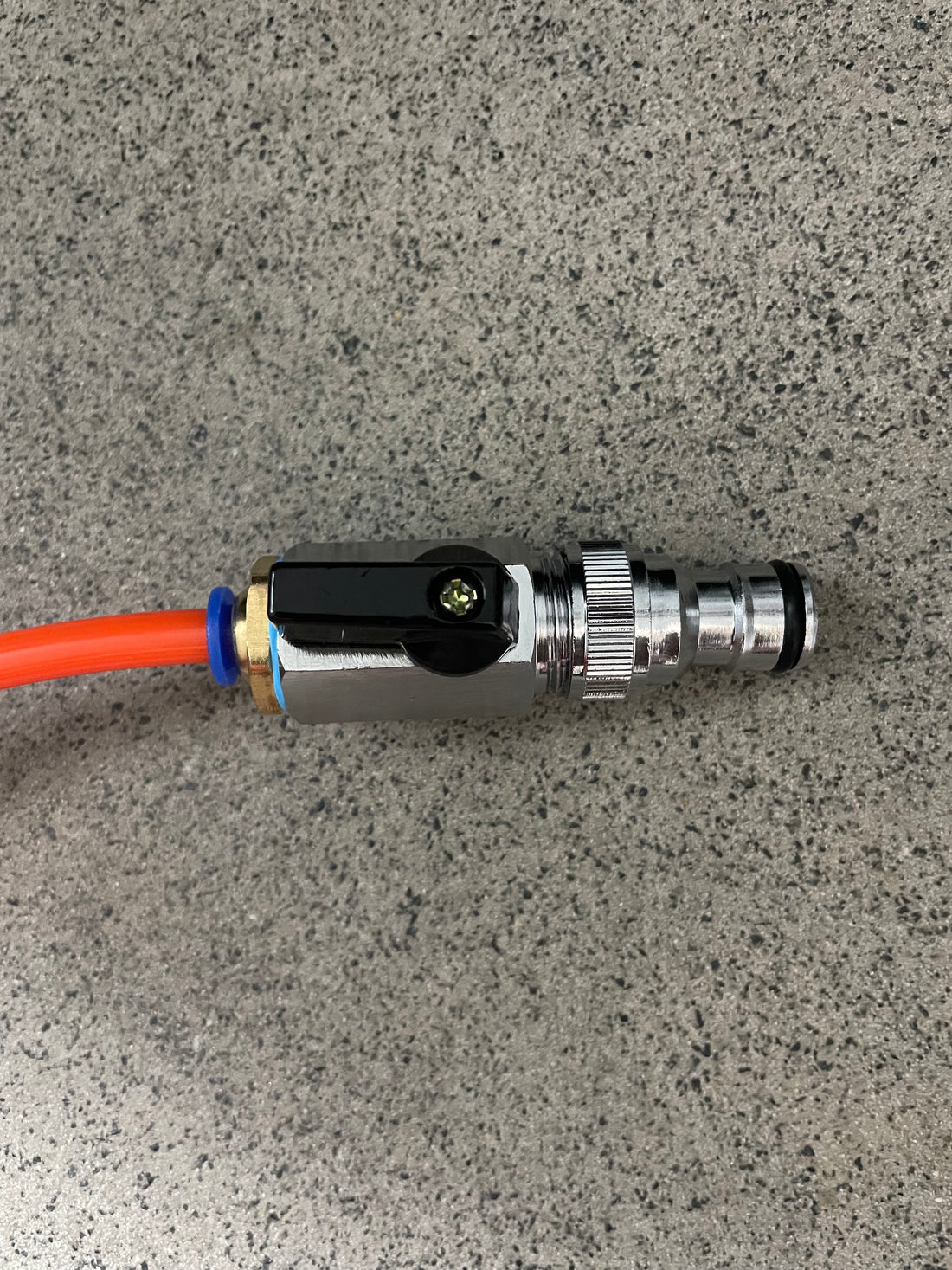 Close-up of 8mm push fit connector and flow control valve for water fed pole systems