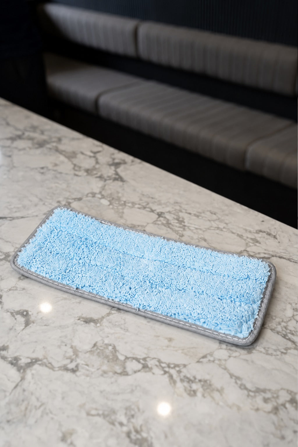 The blue microfibre cleaning pad that comes with the SFR Glide Pro, microfibre side up
