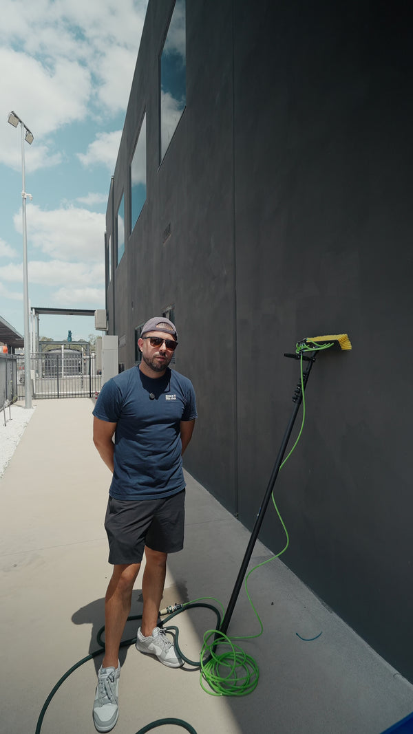 22ft water fed pole kit in use cleaning windows with DI water
