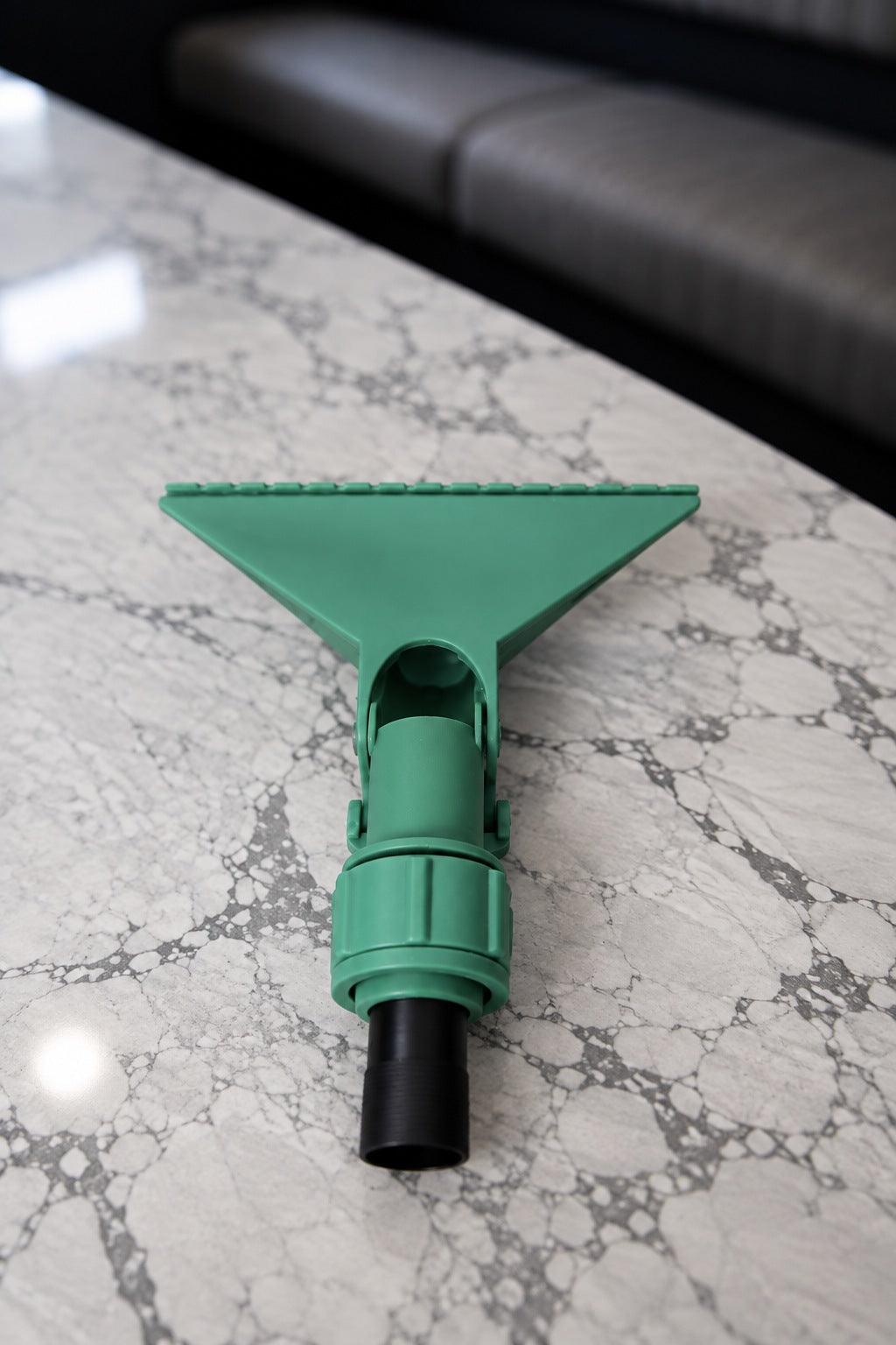 Green Fixi clamp showing the collar and black threaded adapter